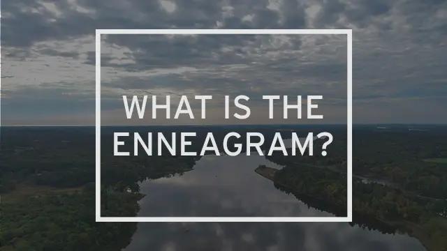 A dulled picture of a river landscape with "What is the Enneagram?" written over it.